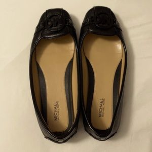 black leather micheal kors slip ons